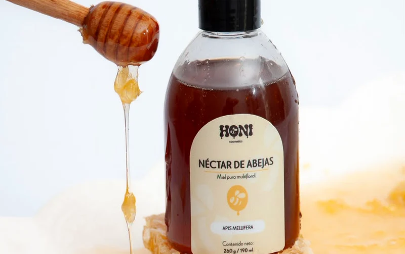 Miel pura Néctar de Abejas goteando